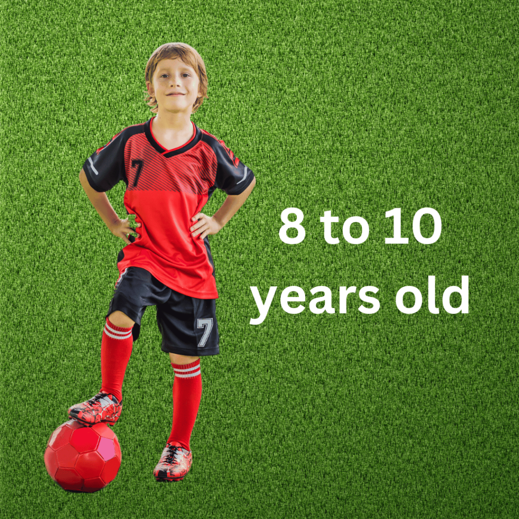 Boy with red soccer ball